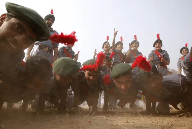 Cadets from the National Cadet Corps (NCC) celebrate after being awarded the first place in a marching competition during the Republic Day celebrations in Chandigarh, India, January 26, 2016. (Photo by Ajay Verma/Reuters)