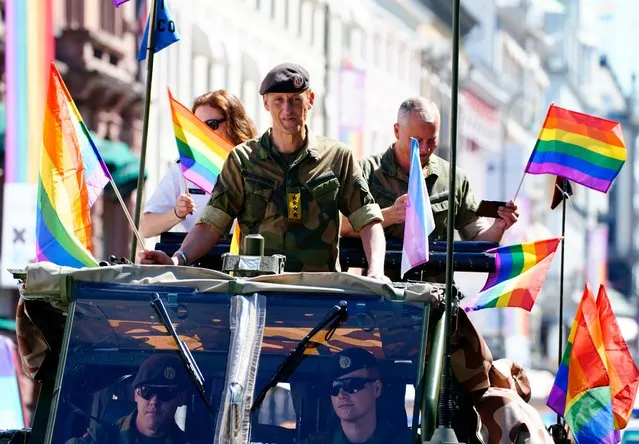 Norway´s Chief of Defense General Eirik Kristoffersen takes part in the LGBTQ pride march in Oslo on June 26, 2021. (Photo by Terje Pedersen/NTB Press via AFP Photo)