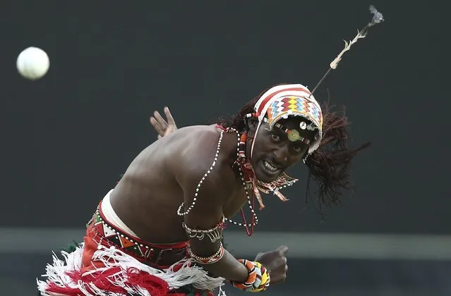 A member of the Maasai Cricket Warriors bowls a ball during a charity cricket match against former Rugby players in Sydney, Australia, Thursday, February 4, 2016. The Maasai Cricket Warriors travel the world to campaign against female genital mutilation and substance abuse, while promoting conservation in their homeland. (Photo by Rob Griffith/AP Photo)