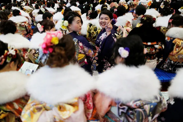 Japanese women wearing kimonos attend their Coming of Age Day celebration ceremony at Toshimaen amusement park in Tokyo, Japan on January 14, 2019. (Photo by Issei Kato/Reuters)