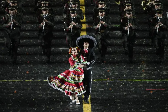 A Mexican military band performs during the Spasskaya Tower International Military Music Festival in Red Square in Moscow, Russia, Thursday, August 26, 2021. (Photo by Alexander Zemlianichenko/AP Photo)