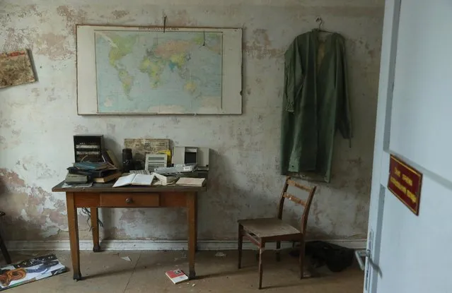 A map of the world in Russian hangs over a desk in the officers' building at the former Soviet military base on January 26, 2017 in Wuensdorf, Germany. (Photo by Sean Gallup/Getty Images)