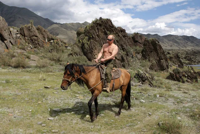 Russia's Prime Minister Vladimir Putin rides a horse in southern Siberia's Tuva region August 3, 2009. (Photo by Alexei Druzhinin/Reuters/RIA Novosti)