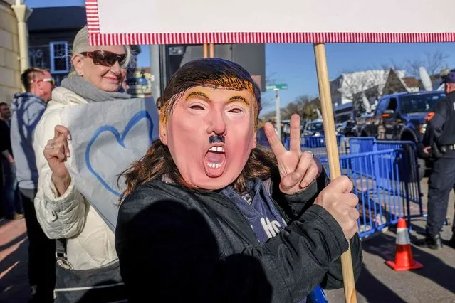 Demonstrators in opposition to U.S. Republican presidential candidate Donald Trump rally near his campaign event in Patchogue, New York April 14, 2016. (Photo by Johnny Milano/Reuters)