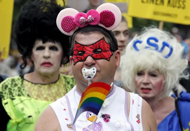 People participate in the annual Christopher Street Day parade on Kurfuerstendamm in Berlin, Germany, June 27, 2015. (Photo by Fabrizio Bensch/Reuters)