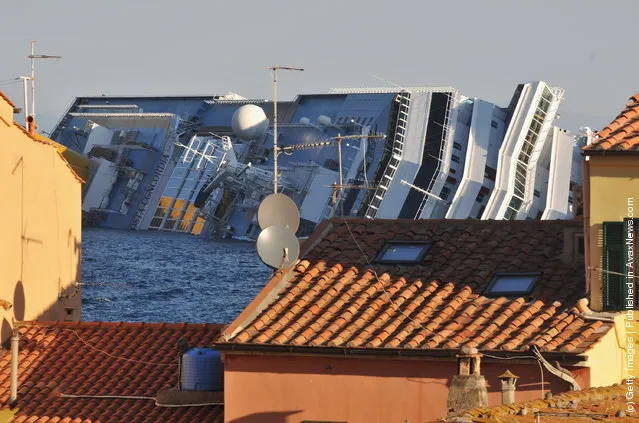 The cruise ship Costa Concordia lies stricken off the shore of the island of Giglio