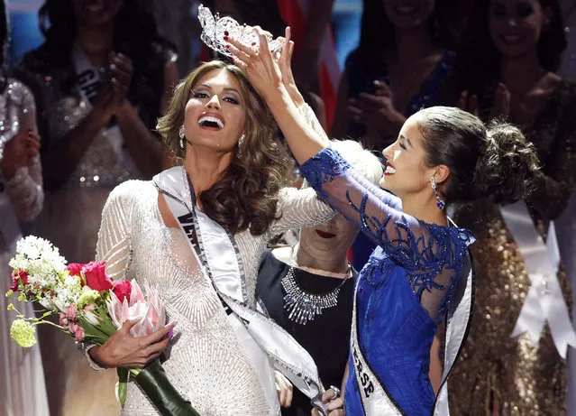 Miss Venezuela Gabriela Isler (L) reacts as she is crowned by Olivia Culpo, Miss Universe 2012, during the Miss Universe pageant at the Crocus City Hall in Moscow on November 9, 2013. (Photo by Maxim Shemetov/Reuters)