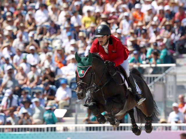 Mexico's Andres Azcarraga with horse Contendros 2 competes in the equestrian's jumping individual qualifier during the Paris 2024 Olympic Games at the Chateau de Versailles, in Versailles, in the western outskirts of Paris, on August 5, 2024. (Photo by Pierre-Philippe Marcou/AFP Photo)