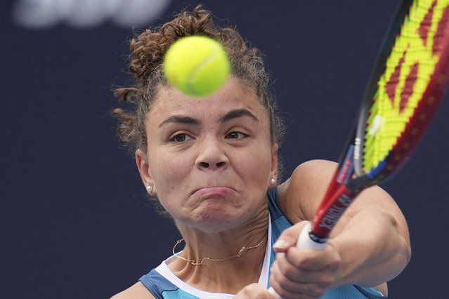Jasmine Paolini of Italy returns a shot from Magda Linette of Poland during the China Open tennis tournament held at the National Tennis Center in Beijing, Monday, September 30, 2024. (Photo by Ng Han Guan/AP Photo)