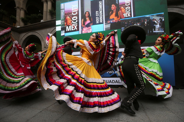 Traditional dancers perform during an event after the FIFA announced Guadalajara as one of the host cities for the 2026 World Cup which will be staged in the United States, Mexico and Canada, in Guadalajara, Mexico on June 16, 2022. (Photo by Fernando Carranza/Reuters)