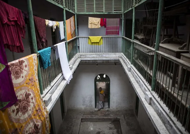 Clothes hang out to dry inside Mukti Bhavan (Salvation House) in Varanasi, in the northern Indian state of Uttar Pradesh, June 19, 2014. (Photo by Danish Siddiqui/Reuters)