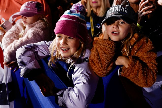 Young supporters listen to Kamala Harris speak during a campaign rally and concert in Ann Arbor, Michigan on October 29, 2024. (Photo by Evelyn Hockstein/Reuters)