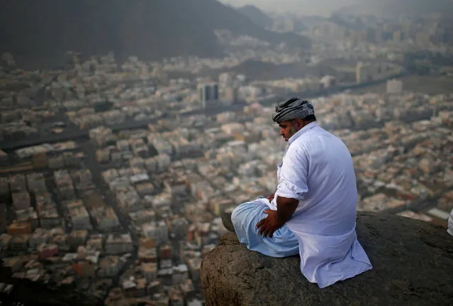 A Muslim pilgrim visits Jabal al-Nour, where Muslims believe the prophet Muhammad received the first words of the Qur’an through Gabriel in the Hira cave near Mecca, Saudi Arabia on August 28, 2017. (Photo by Suhaib Salem/Reuters)