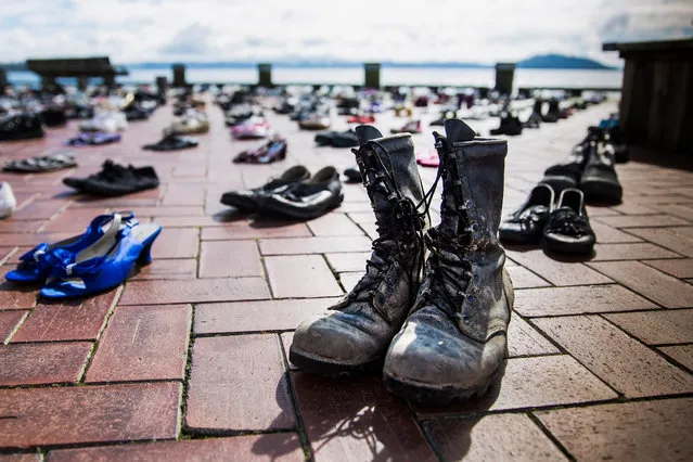 Shoes representing victims of suicide are seen on August 31, 2017 in Rotorua, New Zealand. The 606 pairs of shoes represent each person lost in 2016 and 2017 to suicide in New Zealand, with the aim of raising awareness about suicide prevention. (Photo by Mead Norton/Getty Images)