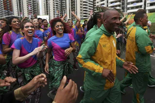 2016 Rio Olympics, Olympic Village on July 29, 2016. Members of South Africa take part in their official welcome ceremony. (Photo by Edgard Garrido/Reuters)
