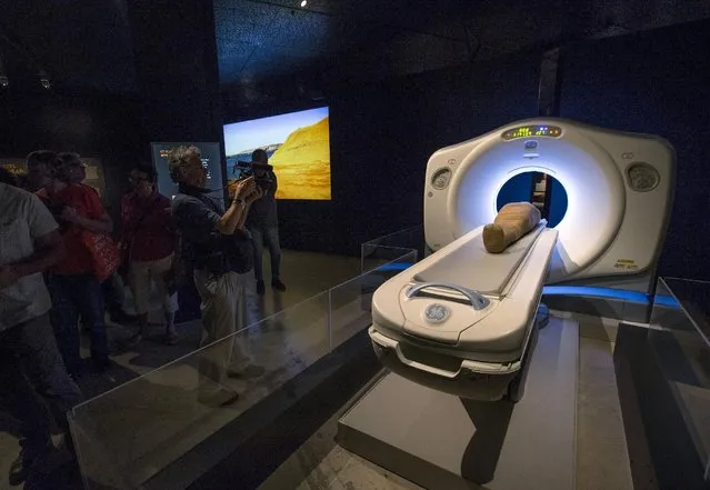 A CT scan machine is seen on display during a media preview for the exhibit “Mummies: New Secrets from the Tombs” at the Natural History Museum of Los Angeles County in Los Angeles, California September 10, 2015. (Photo by Mario Anzuoni/Reuters)
