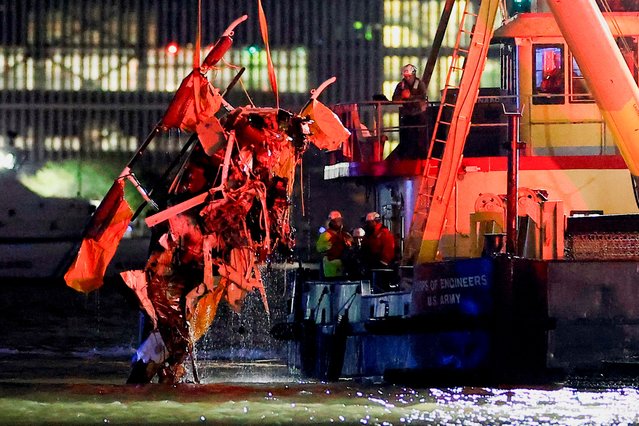 Emergency personnel work at the scene of a helicopter crash on the Hudson River near lower Manhattan in New York, as seen from Newport, New Jersey U.S., April 10, 2025. (Photo by Eduardo Munoz/Reuters)