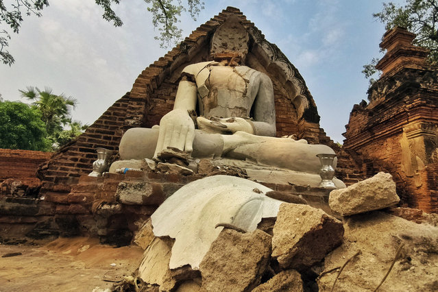 A damaged Buddha statue is pictured in Inn Wa on the outskirts of Mandalay on April 6, 2025, following the devastating March 28 earthquake. The shallow 7.7-magnitude earthquake on March 28 flattened buildings across Myanmar, killing more than 3,400 people and making thousands more homeless. (Photo by AFP Photo/Stringer)