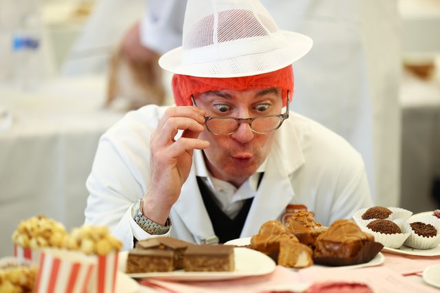 Judge, Iain Campbell poses for a photograph as he views baking at Carnegie Conference Centre during judging for Scottish Baker of the Year Awards on March 20, 2024 in Dunfermline, Scotland. Now in its 10th edition, the competition is organised by Scottish Bakers, an industry association that has been supporting and protecting Scotland's bakery trade for over 130 years. Bakers were invited to enter up to 12 products of their choosing to be taste-tested by a panel of expert judges. (Photo by Jeff J. Mitchell/Getty Images)