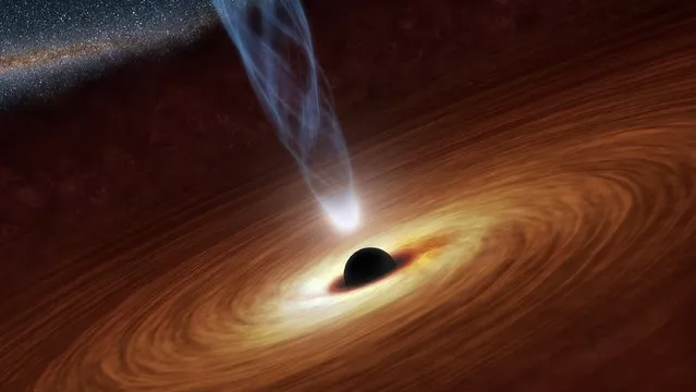 A supermassive black hole with millions to billions times the mass of our sun. The accretion disk surrounding the center forms as the dust and gas in the galaxy falls onto the hole, attracted by its gravity. Also shown is an outflowing jet of energetic particles, believed to be powered by the black hole's spin. (Photo by Reuters/NASA/JPL-Caltech)