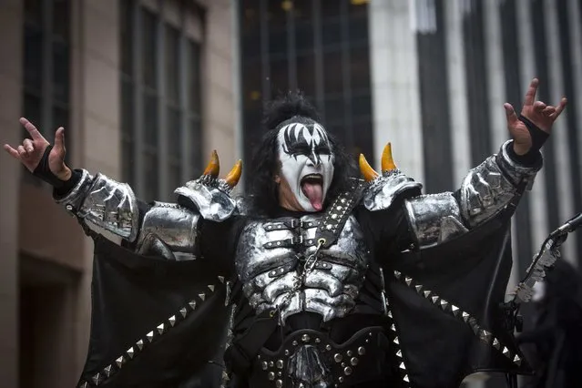 Gene Simmons of KISS greets spectators during the 88th Annual Macy's Thanksgiving Day Parade in New York November 27, 2014. (Photo by Andrew Kelly/Reuters)