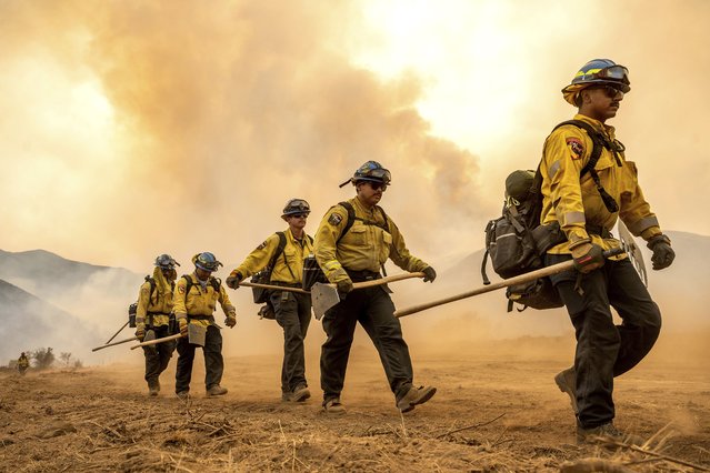 Firefighters battle the Gifford Fire burning on Monday, August 4, 2025, in Los Padres National Forest, Calif. (Photo by Noah Berger/AP Photo)