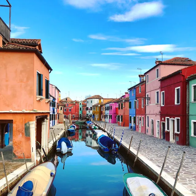“The island of Burano, in the Venice lagoon, allows you to immerse yourself in colours galore amid its Lego-like buildings. It’s a stunning little island where you can disappear into a mesmerising world”. (Photo by Brenda McCulley/The Guardian)