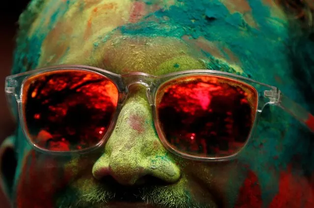A man attends Holi celebrations in Mumbai, India on March 7, 2023. (Photo by Francis Mascarenhas/Reuters)