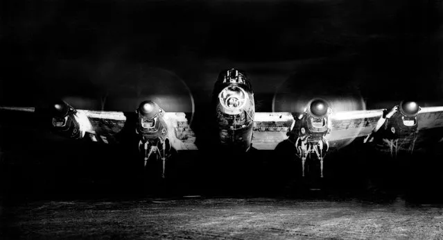 An Avro Lancaster BI (R5729/KM-A), of 44 Squadron, running up its engines in a dispersal at Dunholme Lodge, Lincolnshire, before setting out on a night raid to Berlin, 1944. (Photo by Air Historical Branch/RAF/PA Wire)