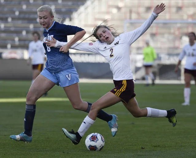 Emma Sees, Valor Christian, #6, accidentally grabs Windsor's Alexa Kopren's hair while both were chasing after the ball in the second half of the Colorado State girls 4A soccer championship at Dick's Sporting Goods Park May 23, 2018. (Photo by Andy Cross/The Denver Post)