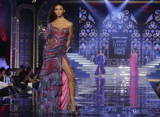 In this August 26, 2018, file photo, models display creations by Monisha Jaising at the grand finale during Lakme Fashion Week in Mumbai, India. (Photo by Rafiq Maqbool/AP Photo)