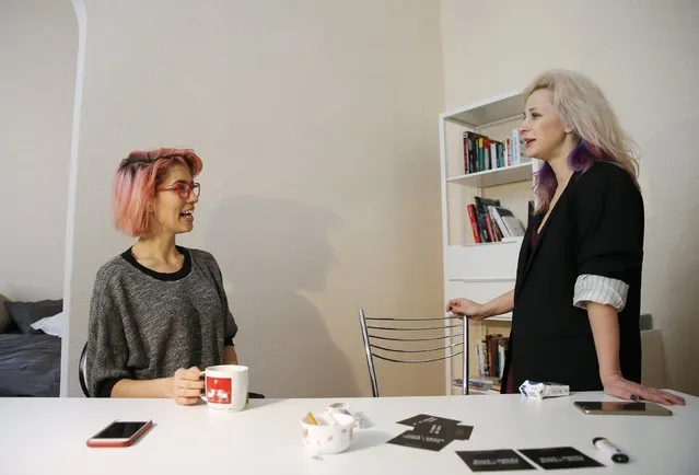 Maria Alyokhina (R) and Nadezhda Tolokonnikova, members of the punk protest band p*ssy Riot, attend an interview with Reuters in Moscow February 19, 2015. Russian punk rock group p*ssy Riot released their first song in English on Wednesday, a musical tribute to Eric Garner, the unarmed black man whose death in a police chokehold last summer sparked wide protests against police violence. (Photo by Maxim Shemetov/Reuters)