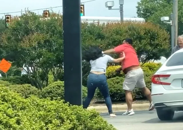 Two drivers get into a fight while waiting in line at a gas station amid fuel shortages in Knightdale, North Carolina, May 10, 2021. (Photo by @shaaddeez/Instagram via Reuters)