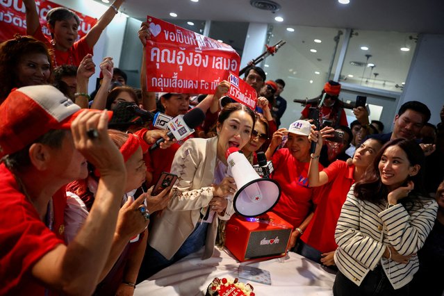 Pheu Thai's prime ministerial candidate, Paetongtarn Shinawatra, attends a birthday celebration held by red shirt supporters, a day ahead of her father, former Prime Minister Thaksin Shinawatra, coming home from self-exile, at the party headquarter in Bangkok, Thailand on August 21, 2023. (Photo by Athit Perawongmetha/Reuters)