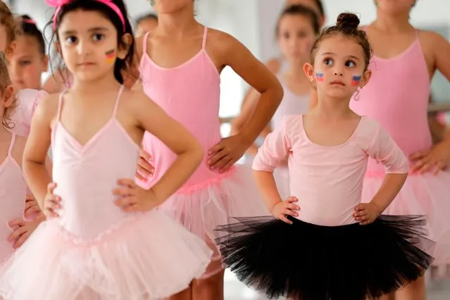 Lebanese girls attend a ballet class at the Russian- Lebanese cultural centre in the city of Aley, east of Beirut on July 5, 2018. Moscow may have won influence in war- torn Syria through its blistering military intervention, but it is adopting a softer approach in neighbouring Lebanon, where France and the US have held stronger sway. (Photo by Joseph Eid/AFP Photo)