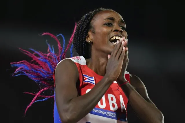Cuba's Yunisleidy Garcia celebrates winning the gold medal in the women's 100-meters final at the Pan American Games in Santiago, Chile, Tuesday, October 31, 2023. (Photo by Natacha Pisarenko/AP Photo)