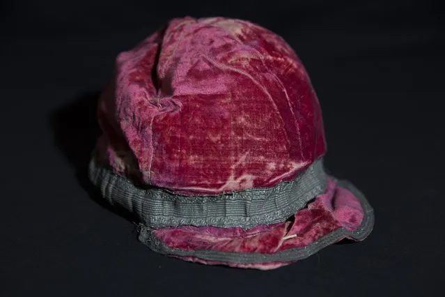 A cap worn by a pupil when he was presented to Queen Adelaide in 1839 is displayed at Rugby School in central England, March 18, 2015. (Photo by Neil Hall/Reuters)