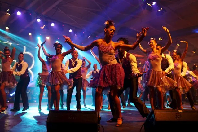 Dancers perform during the gala dinner for the closing of the XVIII Habanos Festival in Havana, March 4, 2016. (Photo by Alexandre Meneghini/Reuters)