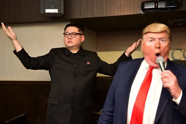 A North Korean leader Kim Jong Un impersonator (L) and a Donald Trump impersonator perform at a bar in Osaka on June 27, 2019, ahead of the G20 summit. (Photo by Laurent Fievet/AFP Photo)