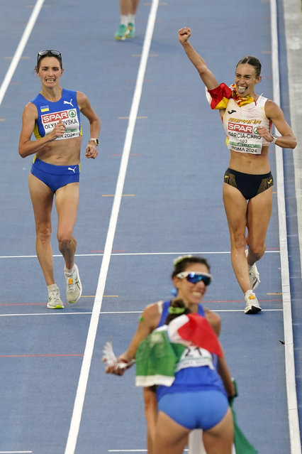 (L-R) Lyudmyla Olyanovska of Team Ukraine and Laura Garcia Caro of Team Spain at the finish line of women's 20 km race walk during day one of the 26th European Athletics Championships - Rome 2024 at Stadio Olimpico on June 07, 2024 in Rome, Italy. (Photo by Pier Marco Tacca/Getty Images)