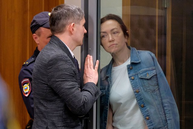 Alsu Kurmasheva, an editor for the U.S. government-funded Radio Free Europe/Radio Liberty's Tatar-Bashkir service, listens to her lawyer during a court hearing in Kazan, Russia on Friday, May 31, 2024. A court in Russia on Friday ordered the detained Russian American journalist to be held until at least Aug. 5, pending investigation and trial, a further step in the Kremlin's crackdown on dissent and free speech. (Photo by AP Photo)