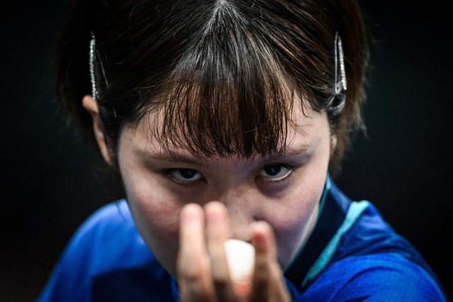 Japan's Miu Hirano eyes the ball as she prepares to serve to India's Manika Batra during their women's table tennis singles round of 16 at the Paris 2024 Olympic Games at the South Paris Arena in Paris on July 31, 2024. (Photo by Jung Yeon-Je/AFP Photo)