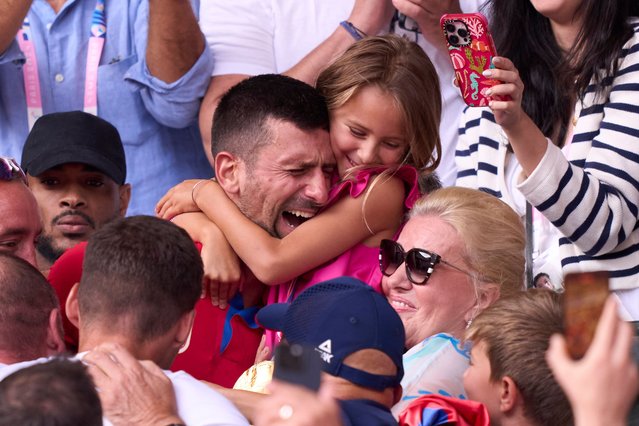 Novak Djokovic of Team Serbia celebrates victory in his players box during the Men's Singles Gold medal match against Carlos Alcaraz of Team Spain on day nine of the Olympic Games Paris 2024 at Roland Garros on August 04, 2024 in Paris, France. (Photo by Diego Souto/Getty Images)