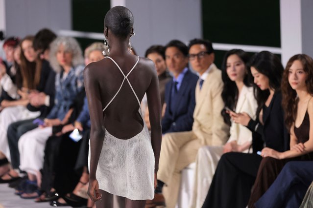 A model presents a creation from the Ralph Lauren Spring/Summer 2025 collection in Bridgehampton, New York, U.S., September 5, 2024. (Photo by Andrew Kelly/Reuters)