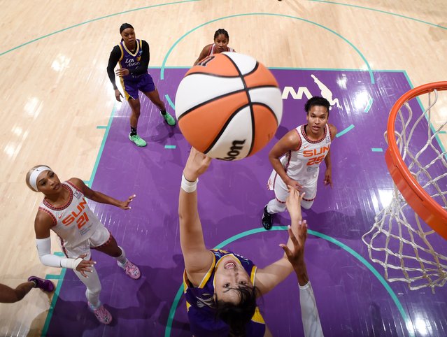 Li Yueru #28 of the Los Angeles Sparks drives to the basket during the game against the Connecticut Sun on September 8, 2024 at Crypto.com Arena in Los Angeles, California. (Photo by Juan Ocampo/NBAE via Getty Images)