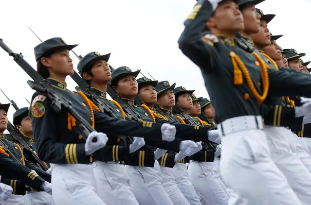 Taiwanese female cadets march during a ceremony to mark the 92nd anniversary of the Whampoa Military Academy, in Kaohsiung, southern Taiwan June 16, 2016. (Photo by Tyrone Siu/Reuters)