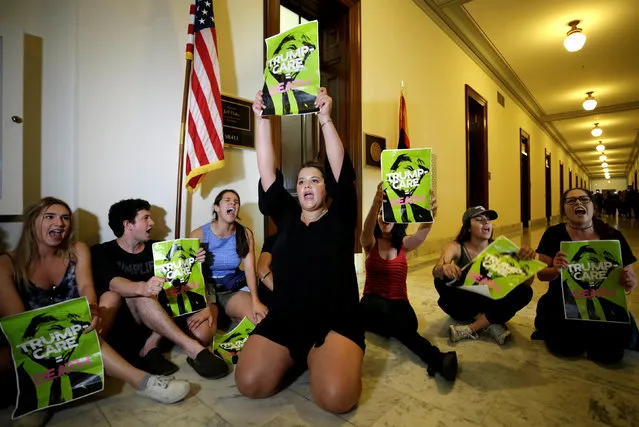 Healthcare activists protest to stop the Republican health care bill at Russell Senate Office Building on Capitol Hill in Washington, U.S., July 10, 2017. (Photo by Yuri Gripas/Reuters)