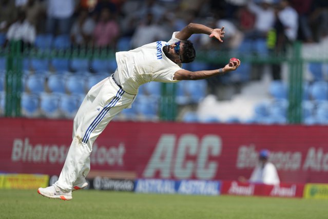 India's Mohammed Siraj takes the catch to get the wicket of Bangladesh's Shakib Al Hasan on the fourth day of the second cricket test match between Bangladesh and India in Kanpur, India, Monday, September 30, 2024. (Photo by Ajit Solanki/AP Photo)