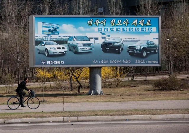 Ironically, the only advertising billboards you can see in Pyongyang are about... cars! (Photo by Eric Lafforgue/Exclusivepix Media)