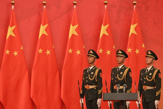 Chinese honour guards are seen during an awards ceremony ahead of China's National Day at the Great Hall of the People in Beijing on September 29, 2024. (Photo by Adek Berry/AFP Photo)